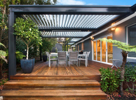 Modern deck with louvered pergola in Germantown, Nashville